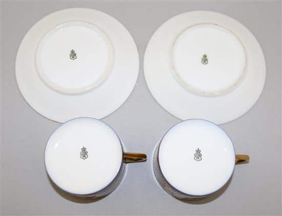 A pair of Sevres style portrait cabinet cups and saucers, by Hutschenreuter, c.1905, saucers 14.5cm